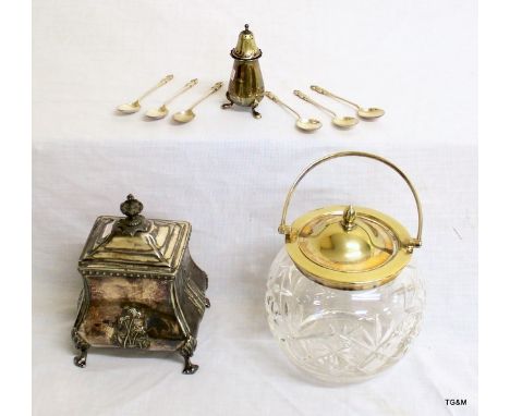 A quantity of silver plated items to include salt shaker, apostle spoons, biscuit jar and tea caddy