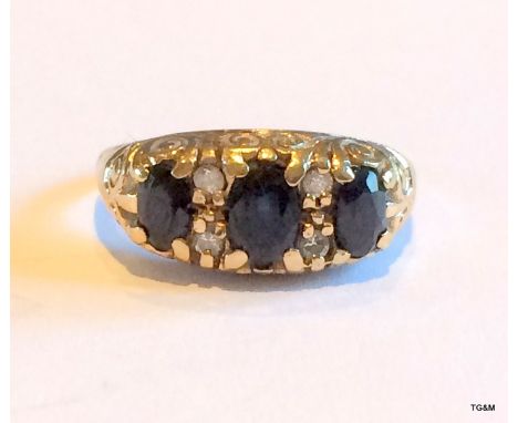 A 9ct gold antique style diamond and sapphire ring size m