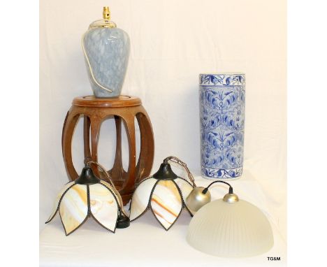 A Chinese table a ceramic cylindrical umbrella stand and various light fittings including wall mounted picture lights