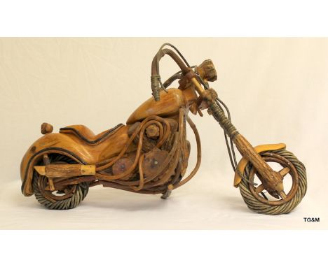 A wooden model of a Harley Davidson motorcycle