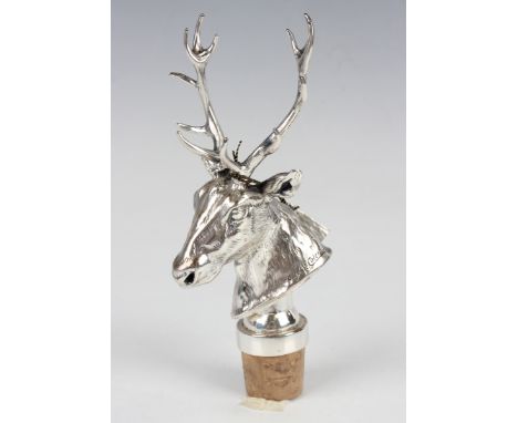 A Spanish J.M. Calero silver and cork decanter stopper in the form of a stag's head, import mark London 2017, total height 15