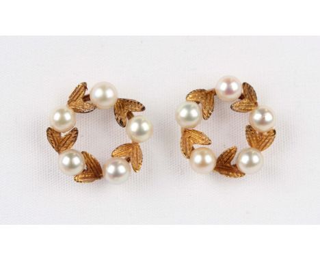 A pair of gold and cultured pearl earstuds, each designed as a wreath, with post and butterfly fittings, each butterfly detai