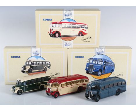 Seventeen Corgi Classics coaches and double deck buses, various liveries, including limited editions, all boxed.Buyer’s Premi