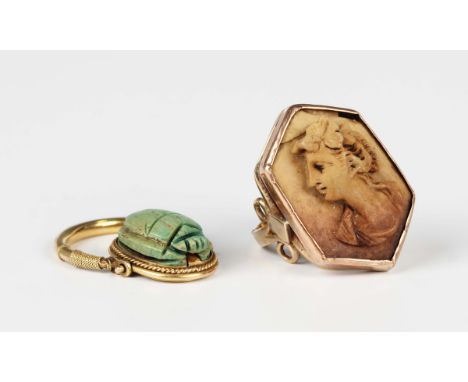 A gold ring, mounted with a hexagonal lava cameo carved as a portrait of a lady, detailed '9ct', weight 5.6g, ring size appro