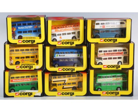 Eighteen Corgi Routemaster buses, including No. 469 'Barratt', No. 469 'Aero' and No. 481 'BEA', all within window boxes.Buye