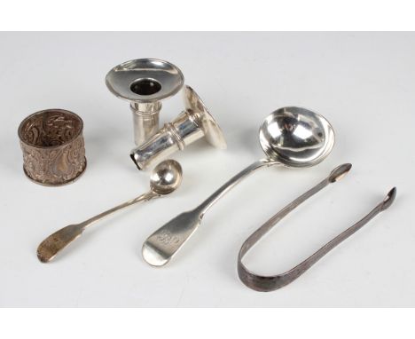 A small group of silver, comprising a late Victorian napkin ring, decorated with putti and scrolls, Birmingham 1894, a Fiddle