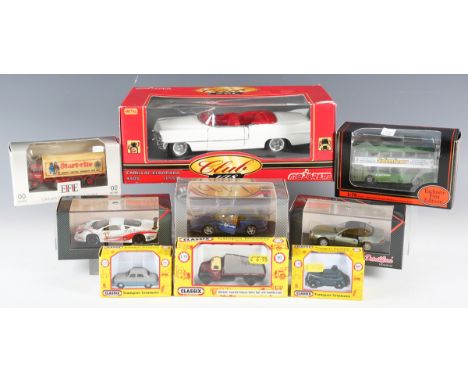 A collection of diecast vehicles, including Classix Transport Treasures, DeetailCars Collection, Gilbow Exclusive First Editi