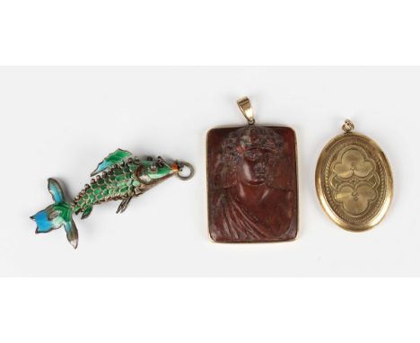 A gold mounted rectangular jasper pendant, designed as a portrait of a classical youth, total weight 14.3g, length 4.8cm, an 