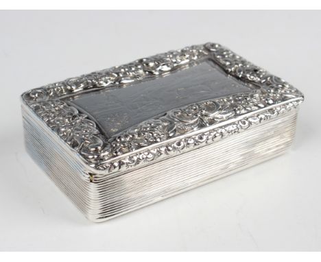 A William IV silver rectangular snuff box, the hinged lid engraved with a hunting scene framed by a raised border of flowers 