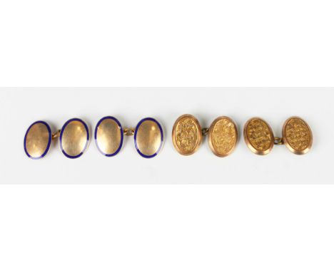A pair of gold and blue enamelled oval cufflinks of dished form with blue enamelled borders, detailed '9ct', weight 6.8g, dim