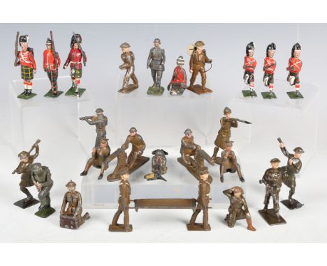 A collection of Britains and other lead figures, including First World War soldiers and Highlanders (playwear, paint chips an