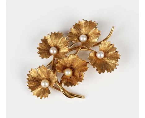 An 18ct gold and cultured pearl brooch, designed as a foliate spray, import mark London 1961, weight 7g, width 4.7cm, with an