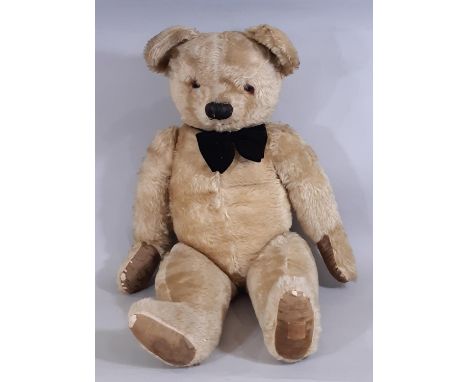 Large Teddy Bear, mid 20th century, by Chad Valley with thick gold plush, jointed body, velveteen paw pads (worn), stitched m