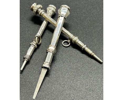 Two silver propelling pencils with etched floral design, together with a silver toothpick maker S. Mordan &amp; Co. Each piec