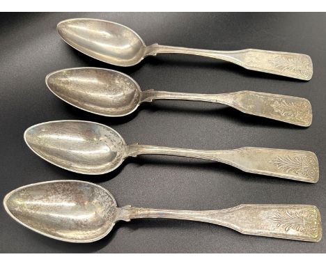 Four Scandinavian silver metal serving spoons, with fern leaf crest, and a matching sauce ladle. 