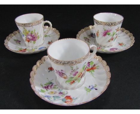 Miscellaneous collection including three Dresden cups and saucers with wrythen fluted panels, floral detail, two miniature Wo