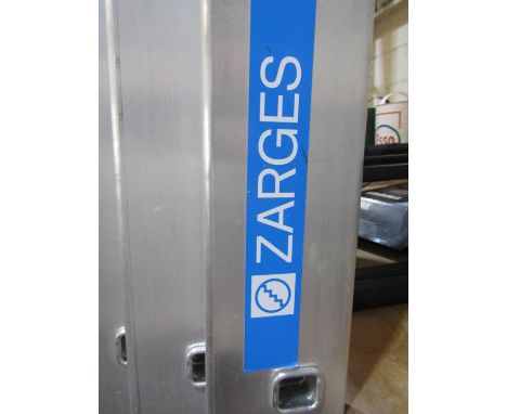 A large three sectional Zarges ladder 