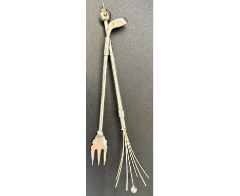A silver pickle fork with a golf club head design, Birmingham 1909, together with a sterling silver cocktail twister with a k
