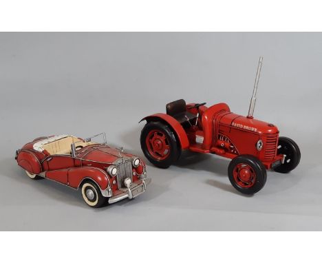 2 tin plate model vehicles comprising Rolls Royce and (boxed) David Brown tractor, both approx length 33cm 