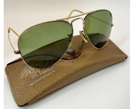 A pair of vintage Ray Ban sunglasses by Bausch &amp; Lomb Ltd with original case and literature 