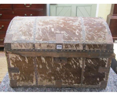 A Georgian pony skin travelling trunk with domed lid by Denny Sadler, Harness and Trunk Maker, Lancaster, 