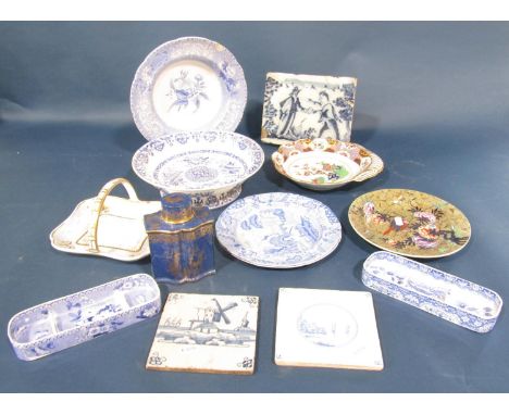 An early Delft tile showing a highway robbery, two Spode blue and white toothpaste dishes, a Spode tea caddy in powder blue w