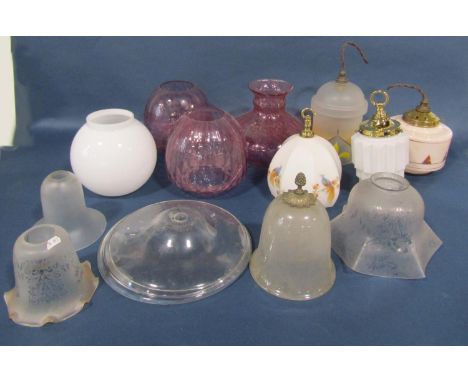 A selection of various styles of light shades of varying shapes, colours and sizes, etc 