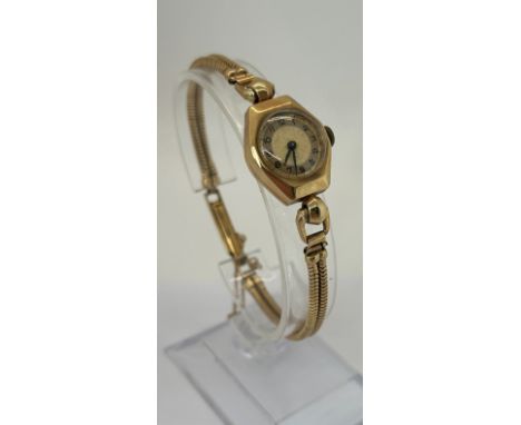 A vintage ladies wristwatch with 9ct gold case and bracelet, 16 grams (with movement removed) 