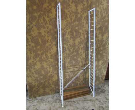 Mid 20th century ladderax type shelving comprising two painted metal uprights, six teak shelves ,and twelve metal shelf suppo