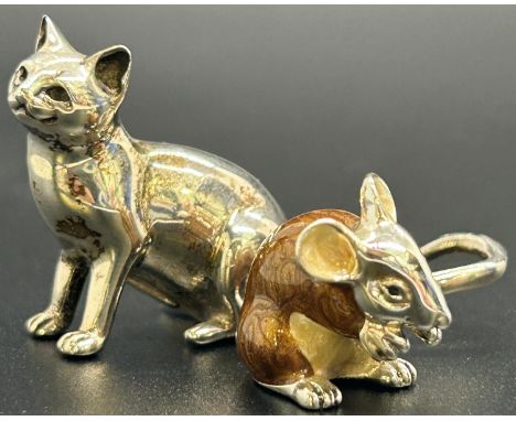 A miniature Saturno sterling silver and enamel mouse in a perched position, together with a miniature Victorian style silver 