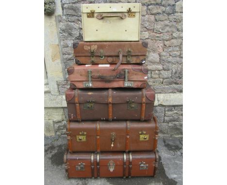 Five pieces of vintage luggage including a vintage velum case 