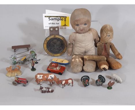 Mixed lot including vintage hollow cast toys most by Britains, some by Charbens or unmarked, together with small cloth dolls 