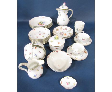 A quantity of Meissen coffee ware comprising coffee pot, coffee cups and saucers, graduated plates, sugar basin and cover etc