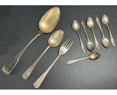 A silver serving spoon, London 1824 maker Richard Britton, together with a cased set of Walker &amp; Hall Christening fork an