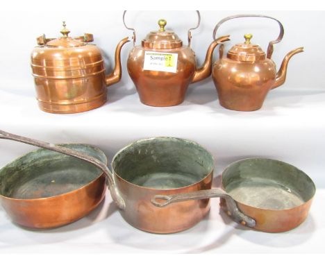 Vintage kitchen copper ware to include two jelly moulds, 26cm diameter, three graduated saucepans with wrought iron handles a