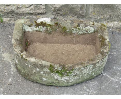 A small weathered D shaped natural stone trough with drainage hole 51 cm wide x 40 cm deep x 17 cm high 
