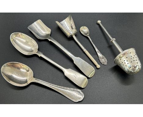 A group of silver teaspoons, sugar shovels, tea infuser etc, mixed makers, total weight 3.3oz approx 