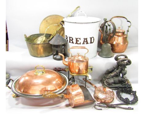 A selection of copper and brassware including a saucepan, a china tureen, horse-chestnut roaster, grain scoop, kettle, enamel