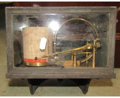 A vintage barograph, unusually in an iron work case with wall bracket fitting with brass mechanism 