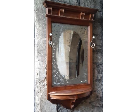 19th century style wall mirror, the mirror plate with oval edged detail, hooks and shelf, 105cm x 60cm 