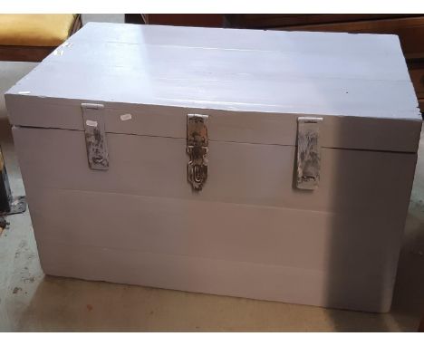 A pine travelling trunk with steel fittings and later painted finish