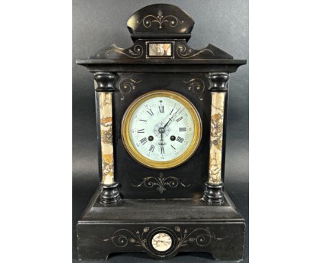 A Victorian black slate and polished marble mantle clock with painted dial, enclosing an eight day striking movement, complet