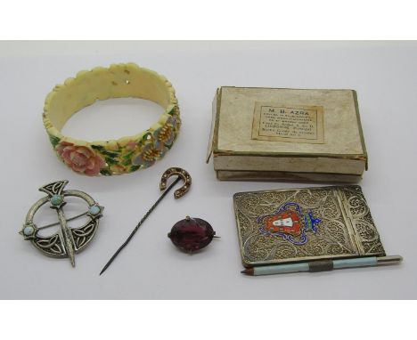 Antique white metal filigree mounted notebook and pencil, a stick pin with yellow metal horseshoe head set with paste and see