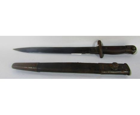 An Indian S.M.L.E. MkII bayonet stamped M.I.L. (Metal Industries of Lahore) with scabbard, overall length 42cm 