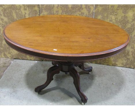 A Victorian mahogany loo table on turned pillar and quadruped base 