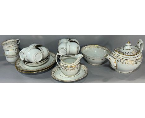 A Chamberlains Worcester tea service, the white ground with gilded borders, comprising oval teapot slop bowl and stand, milk 