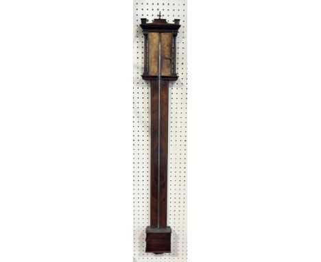 A Georgian barometer in walnut with paper dial, tapering column supports and architectural pediment 