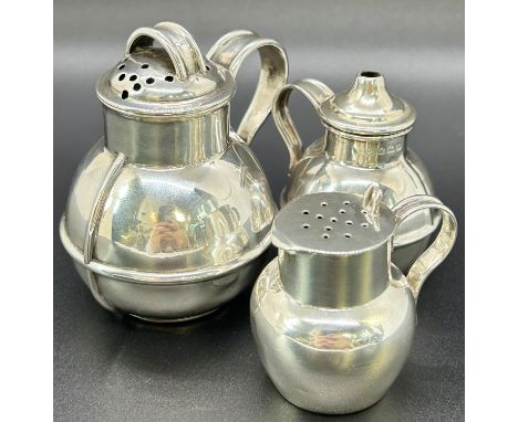 A miniature silver Guernsey milk can, together with two silver salt/pepper sifters, mixed makers, weight 2.8 oz approx 