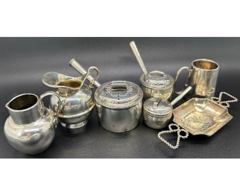 A sweet silver miniature kitchen lot consisting of two pepperettes in the form of Victorian style saucepans, a small sauce pa