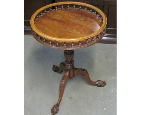 An Indian bowl of circular form with painted floral detail, a Georgian style occasional table in yew wood on wrythen fluted c